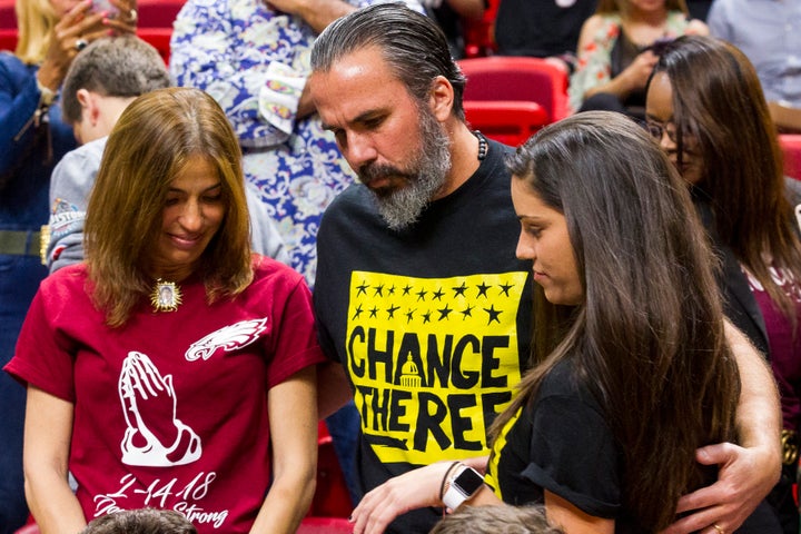Joaquin Oliver's parents, Manuel and Patricia Oliver, attended Saturday's game with their daughter, Andrea Ghersi.