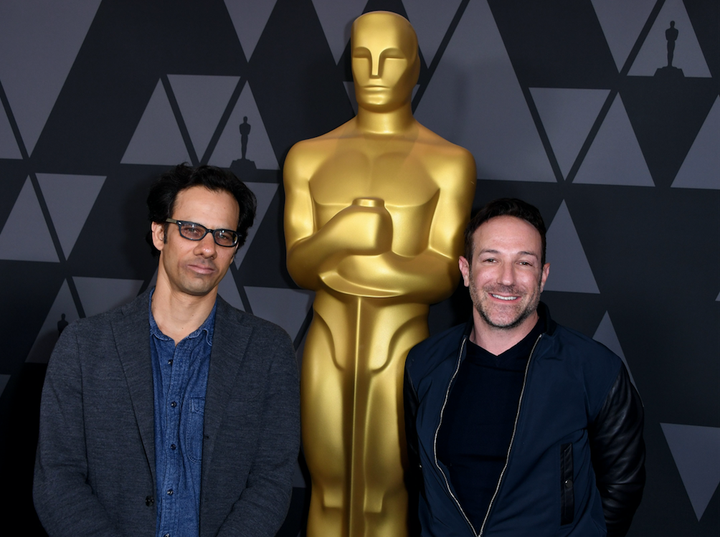 "Icarus" directors Dan Cogan and Bryan Fogel arrive at a pre-Oscars reception.