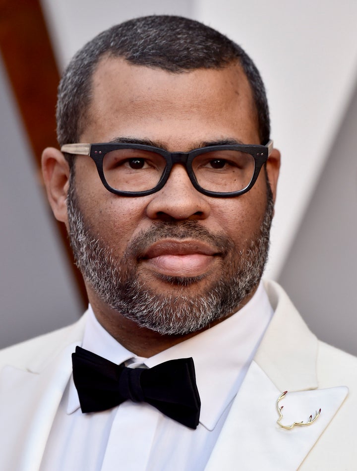 Jordan Peele's antler lapel pin.