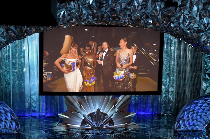 The stars at the Dolby Theatre watched the action on the big screen 