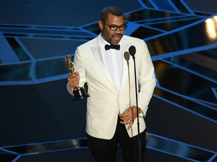 Jordan Peele accepts the award for Best Original Screenplay for "Get Out."