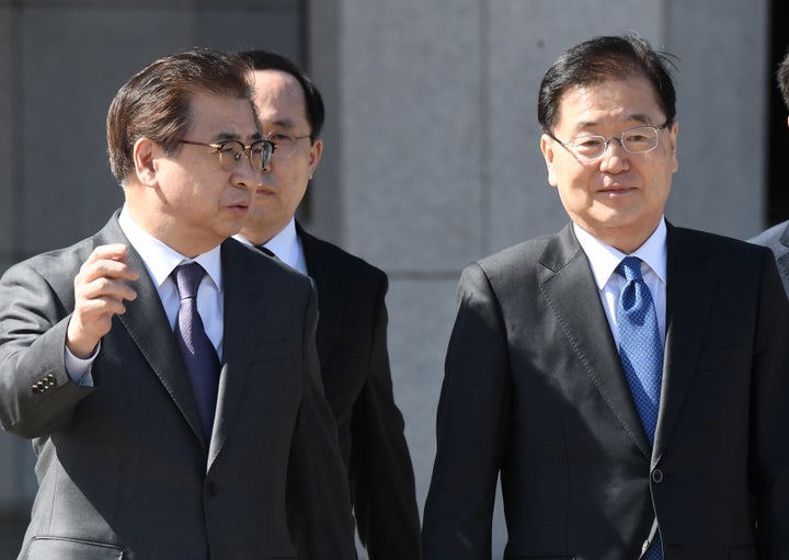 Chung Eui-yong, right, head of the presidential National Security Office, and Suh Hoon, left, the chief of the South's National Intelligence Service, flew to Pyongyang on March 5 to push for talks between the nuclear-armed North and the United States.