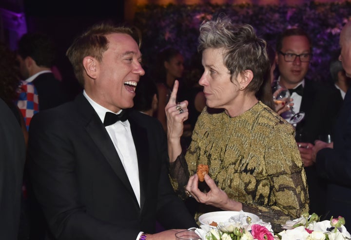 Frances McDormand chats with talent agent Kevin Huvane at the Vanity Fair Oscar Party.