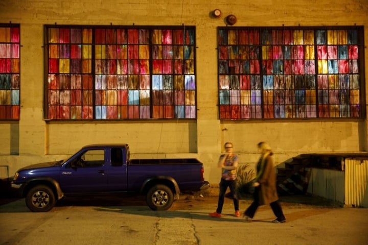 Pedestrians walk past the 356 Mission art gallery in Boyle Heights. 