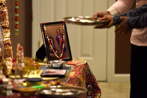 A photograph of Rekhaben Shah holds a special place on the altar of Kaushal Shah, Rekhaben’s son.