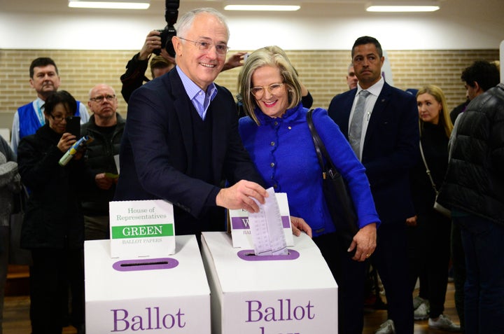 Australian Prime Minister Malcolm Turnbull casts his ballot, with wife Lucy, in the 2016 election.