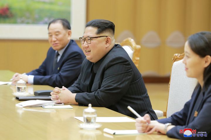North Korean leader Kim Jong Un meets members of the special delegation of South Korea's President in this photo released by North Korea's Korean Central News Agency (KCNA) on March 6, 2018.