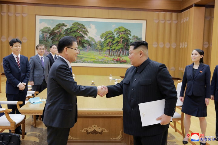 North Korean leader Kim Jong Un shakes hands with Chung Eui-yong who is leading a special delegation of South Korea's Preside