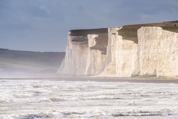 The Birling Gap coastal reserve where police earlier found what is believed to be the woman's husband and two sons