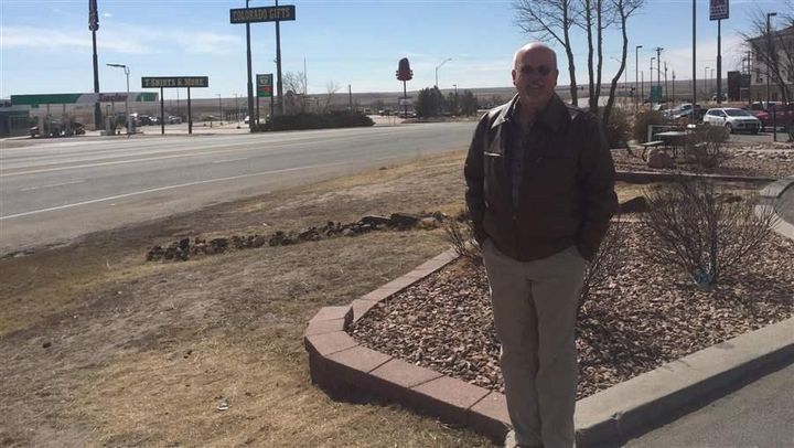 Troy McCue, executive director for the Lincoln County Economic Development Corporation, stands surrounded by gas stations, fast-food restaurants and hotels close to Limon, Colorado. Local economic development officials such as McCue hope that the foreign trade zone will attract new businesses to the area.