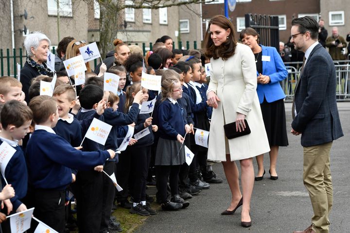 The Duchess of Cambridge meets school children during a visit to Pegasus Primary School in Oxford to learn about the work of the charity Family Links