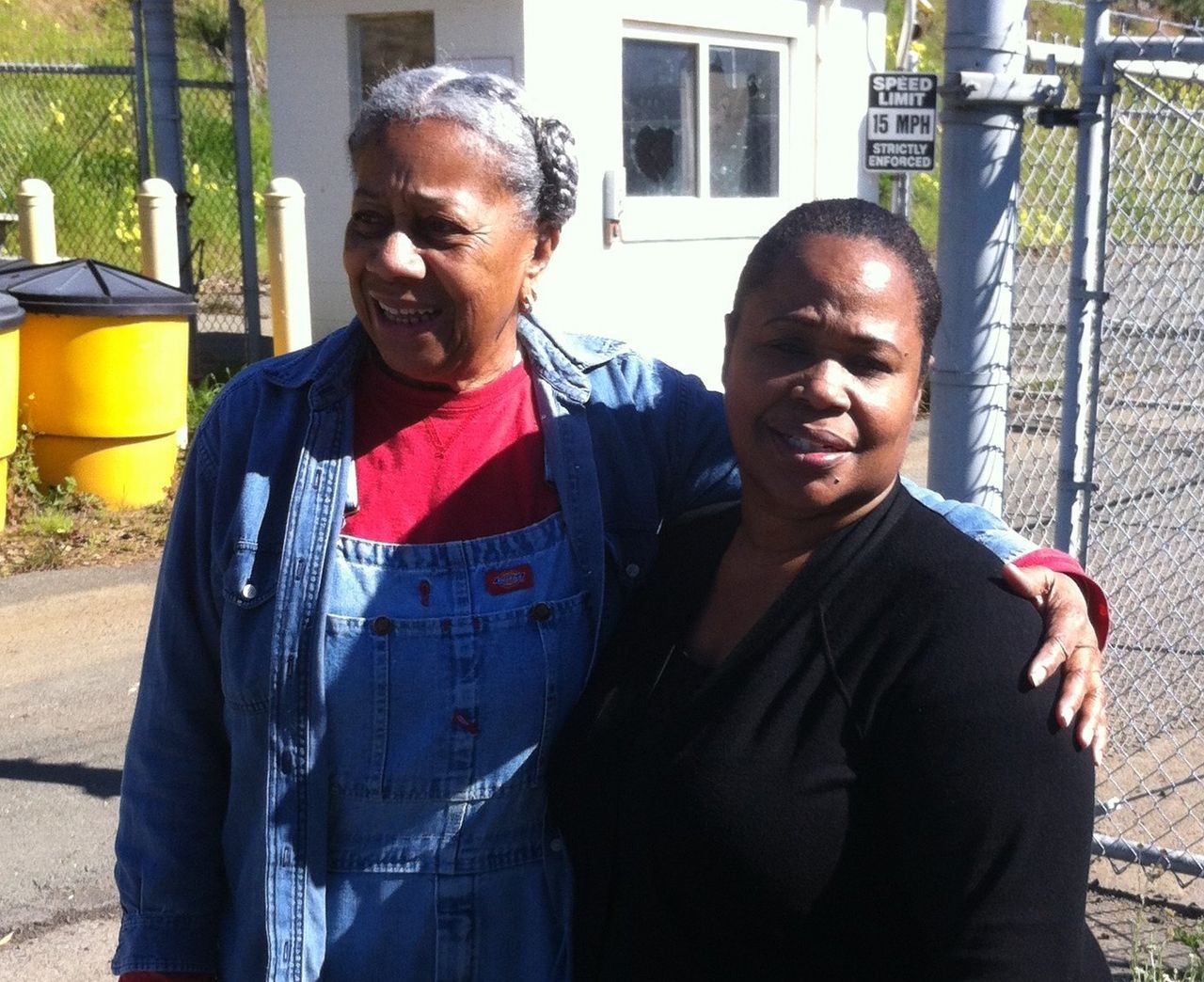 Apache Dodson (left) with local environmental justice activist LaDonna Williams.