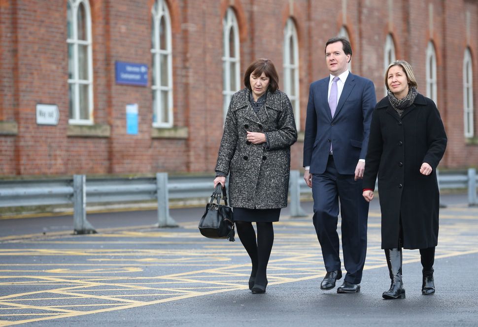 Dyan (right) showing George Osborne the proposed site for HS2 during her role as route managing director of Network Rail. 