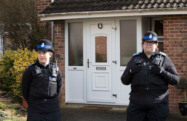 Police officers on guard at the Salisbury Skripal family home 