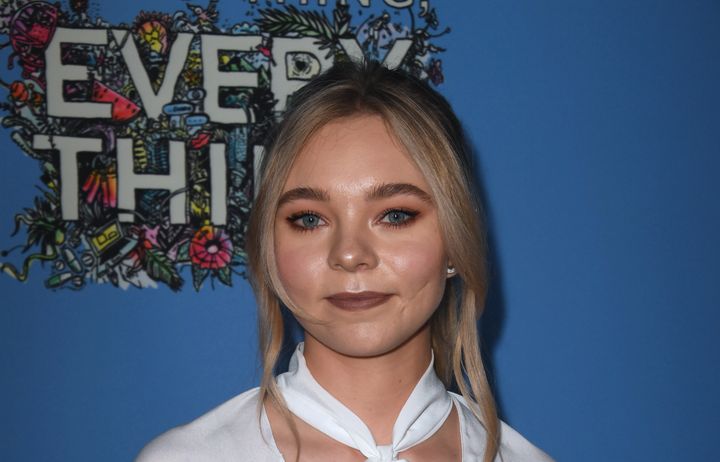 Taylor Hickson, pictured with a visible scar on her left cheek in May 2017, says negligence led to her injury.