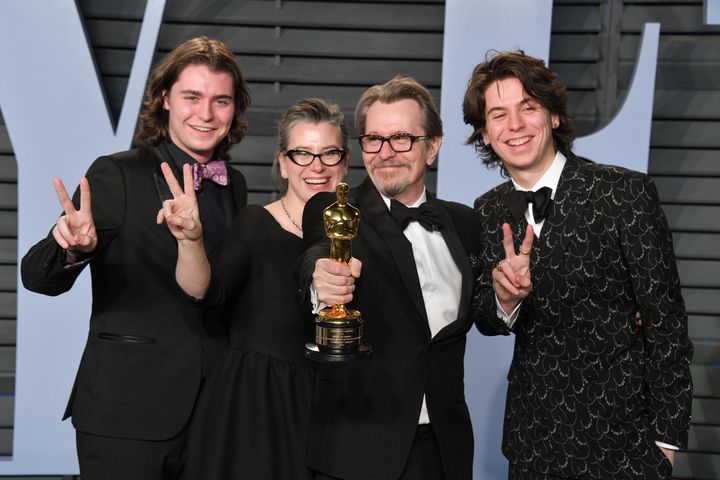 Gulliver Oldman, Gisele Schmidt, actor Gary Oldman and Charlie Oldman attend the 2018 Vanity Fair Oscar Party.