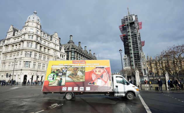 Protestors' vans objecting to the Saudi visit.