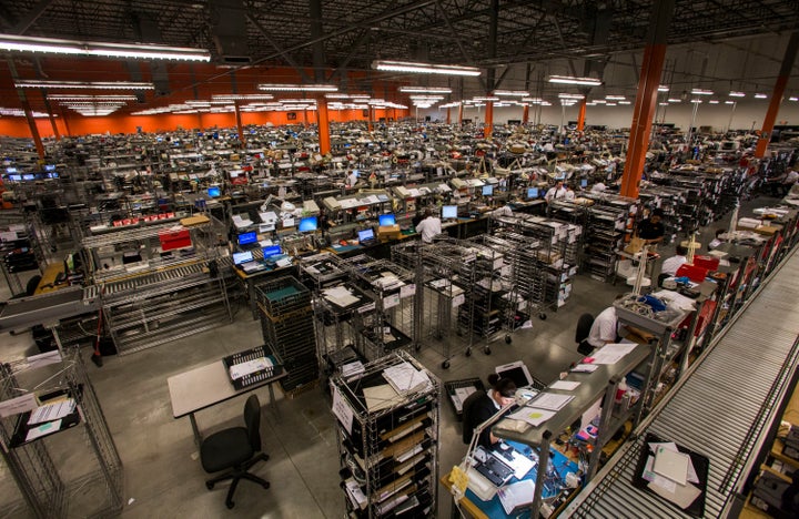 Geek Squad technicians work at the company's repair facility in Hillview, Kentucky, in 2012. 