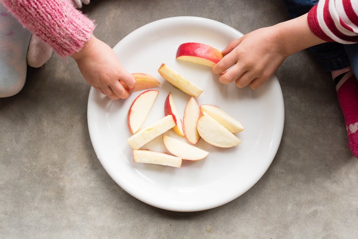 Apples with peanut butter or cheese is one snack option.