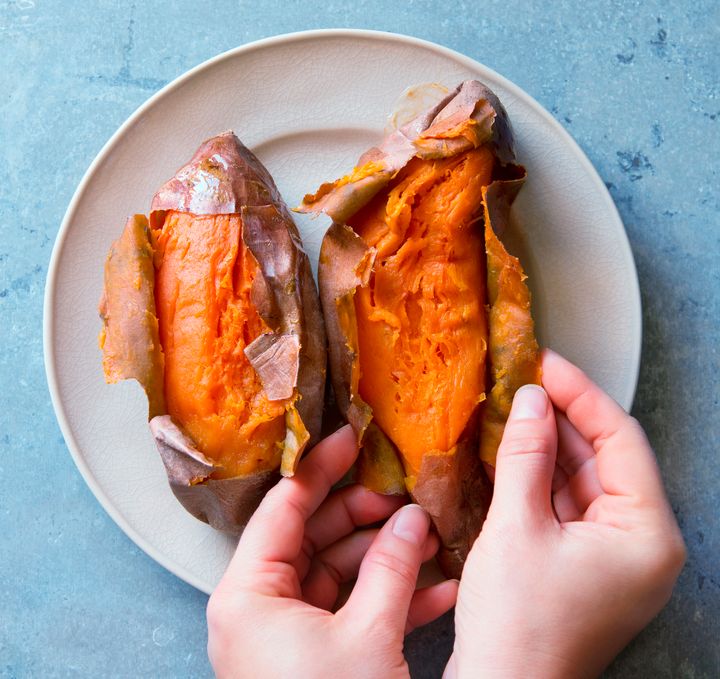A baked sweet potato can be the base for a snack.