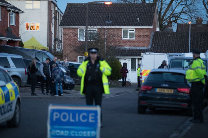 Police officers search the home of Sergei Skripal.