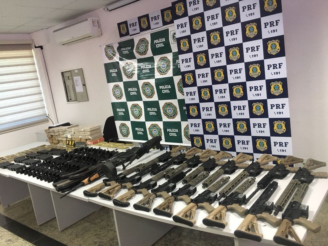 Rifles seized last month in Brazil. On the side of the rifles is an image of the U.S. flag.