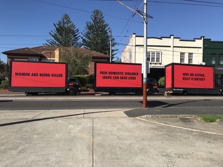 The mobile billboards outside the office of Australia's minister for women.