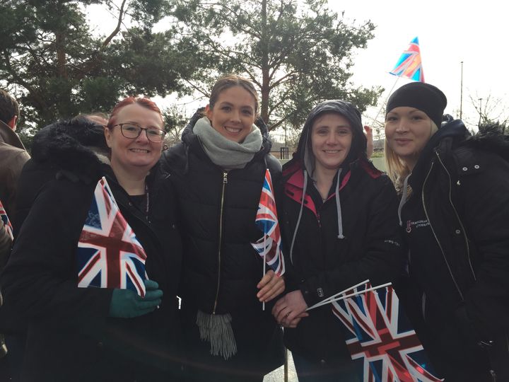 Lydia, Karen, Lucy and Becky, representatives from homeless charity Forgotten Feet, braved the rain to spot Harry and Meghan