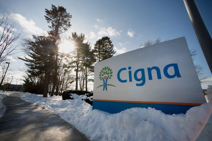 Snow covers the ground around Cigna Corp. signage displayed at the company's headquarters in Bloomfield, Connecticut, U.S., on Friday, Feb. 6, 2015. (Ron Antonelli/Bloomberg via Getty Images)