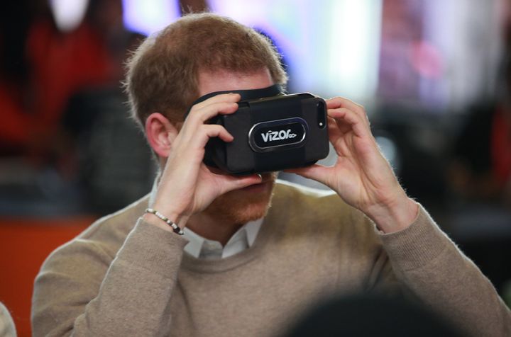 Harry tries out a VR headset during a visit to Millennium Point to celebrate International Women's Day