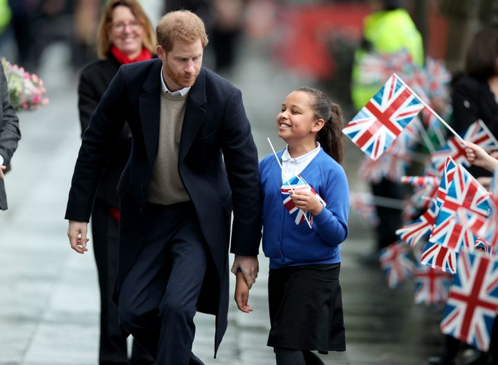 Harry takes 10-year-old Sophia Richards, a pupil from the Oasis Academy Warndon in Worcester, to meet Meghan