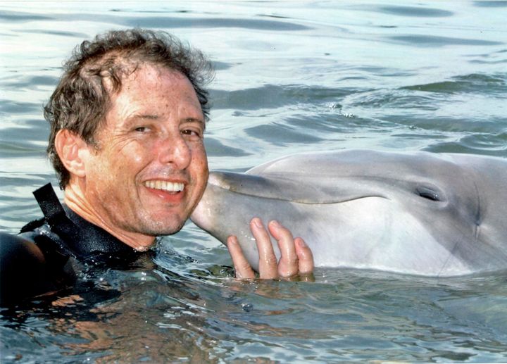 Malcolm Brenner with an unidentified dolphin.