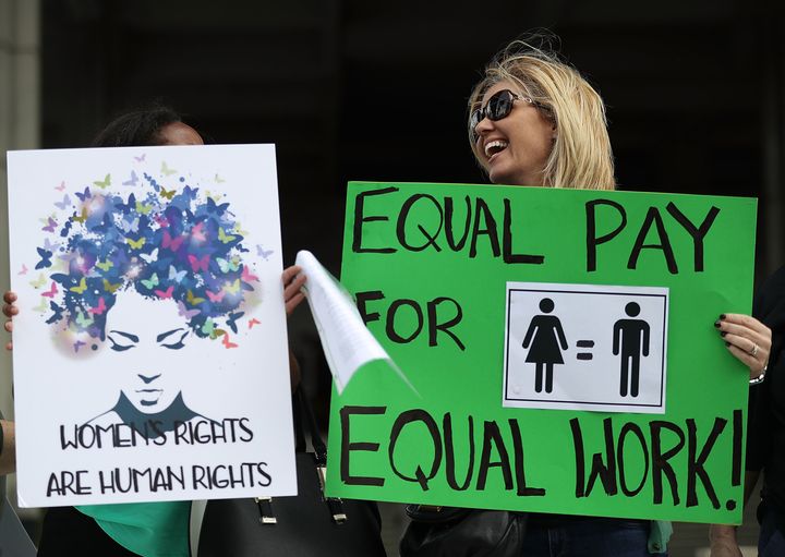 Woman marching for equal pay in Fort Lauderdale, Florida, last year.