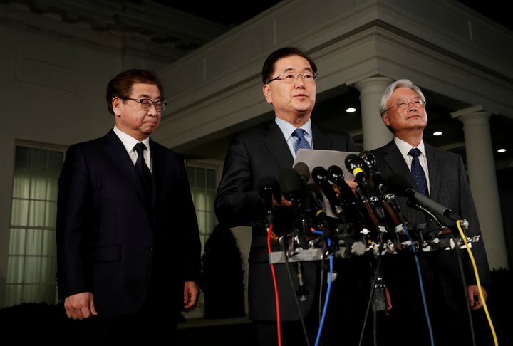 South Korea's national security adviser, Chung Eui-Yong, center, said Thursday that the North Korean leader Kim Jong Un had extended an invitation to meet with U.S. President Donald Trump.