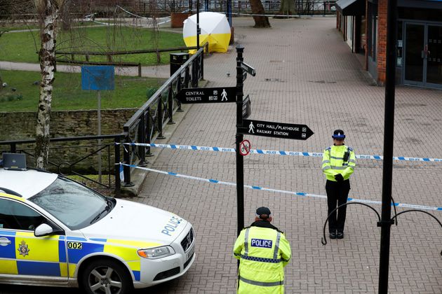 A police officer guards a cordon in front of the area where the Skripals were found 