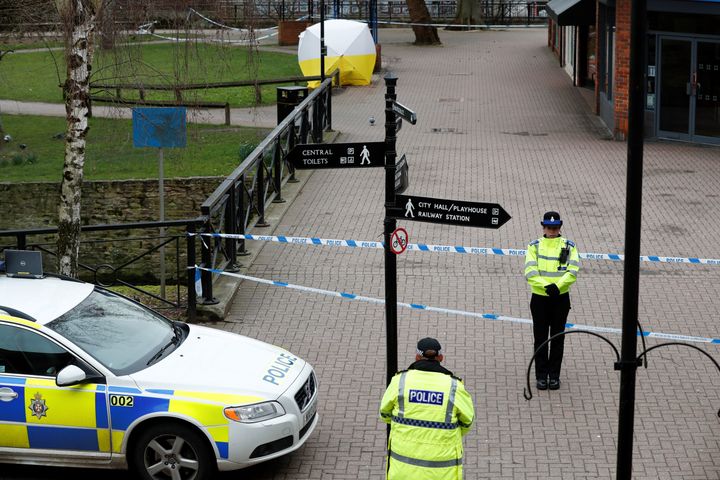 A police officer guards a cordon in front of the area where the Skripals were found 
