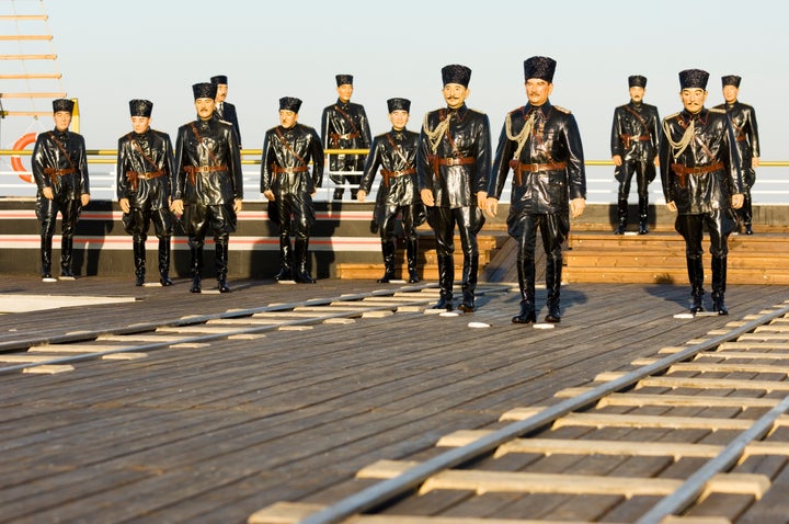 The arrival in Samsun Mustafa Kemal and his friends real size sculpture revived. Samsun city center, Turkey.Turkish name of this place Tutun Iskelesi (tobacco dock)'