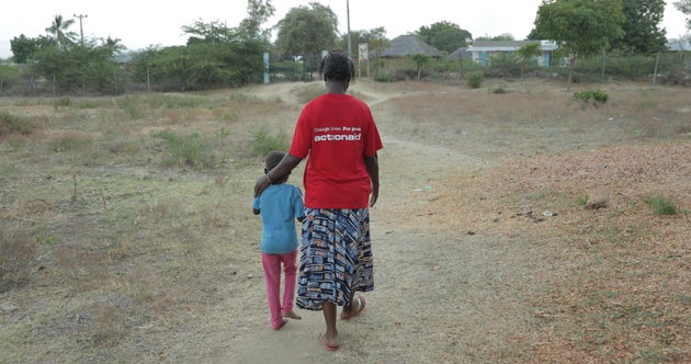 A rape survivor with an ActionAid worker 