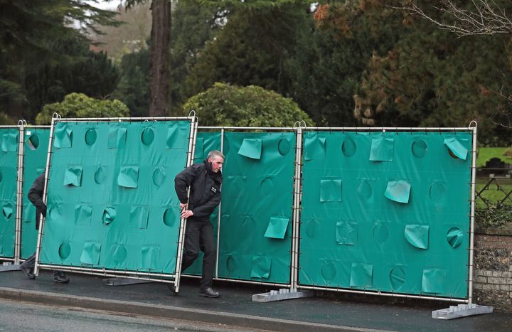 Screens are erected outside the London Road cemetery in Salisbury, Wiltshire, as investigations continue at the cemetery where former Russian double agent Sergei Skripal's wife and son were laid to rest.