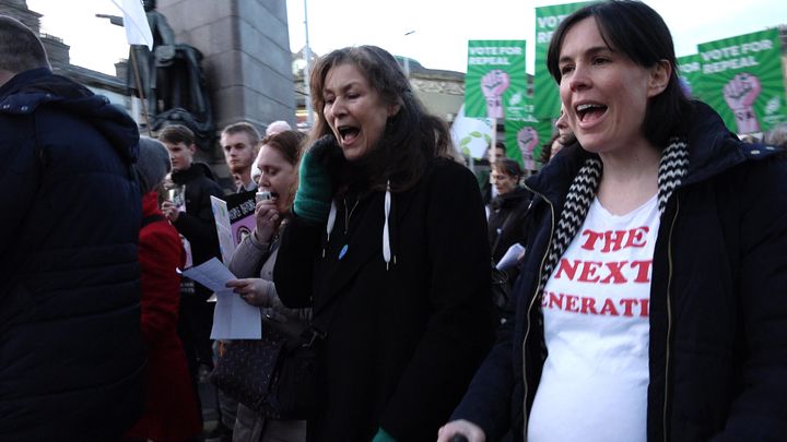 A pregnant woman cries out in support of repealing the eighth amendment.