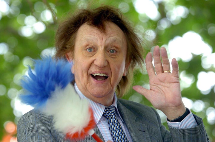 <strong>Sir Ken Dodd, with his tickling stick, had been in hospital with a chest infection.</strong>