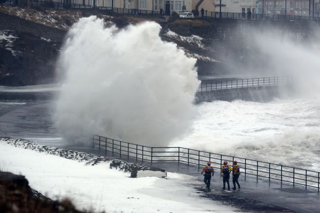 Tynemouth Life Brigade volunteers at Cullercoats in North East England during the Beast from the East 