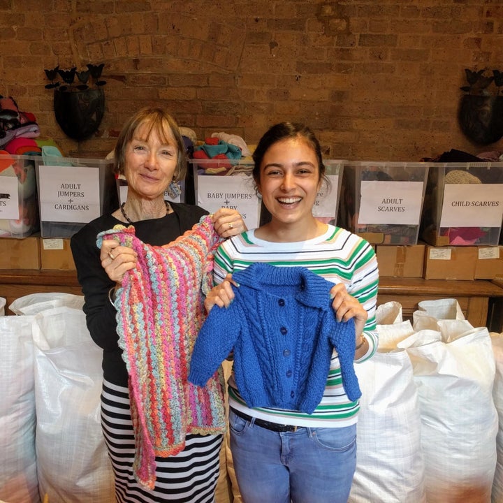 Volunteers sort out donations at Knit For Peace HQ