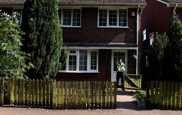 A police officer stands outside the home of Darren Osborne, in Cardiff, Wales, on June 20, 2017. He was convicted of driving a rented van into Muslim worshippers outside a London mosque.