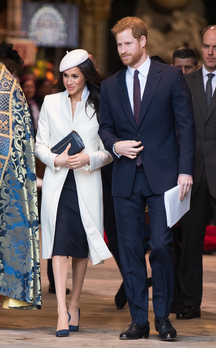 Prince Harry wore a navy suit for the occasion, as did Prince William.