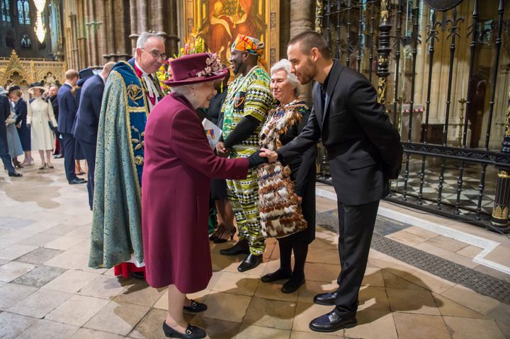 Queen Elizabeth II meets Liam Payne on March 12 at Westminster Abbey. 