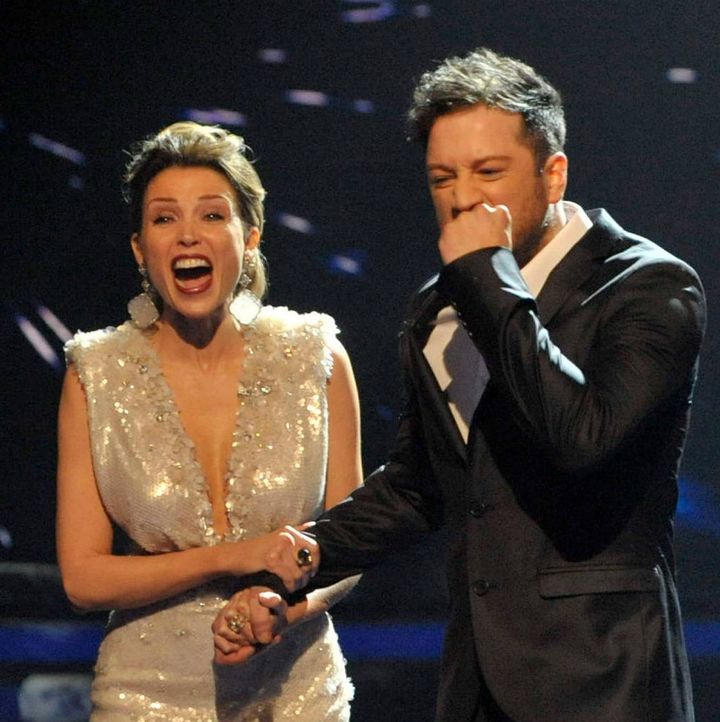 Matt with his mentor Dannii Minogue after winning the 2010 final.