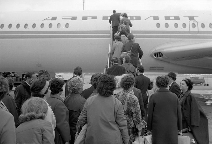 Soviet citizens board an aircraft bound for Moscow at Heathrow in September 1971 after being declared 'persona non grata' by Ted Heath