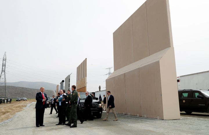 President Donald Trump tours U.S.-Mexico border wall prototypes near the Otay Mesa Port of Entry in San Diego.