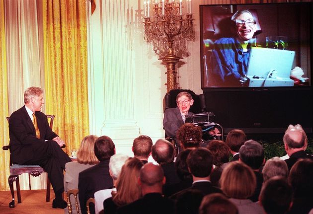 Hawking with Bill Clinton at a White House screening of a scene from 'Star Trek the Next Generation' in the 1990s.